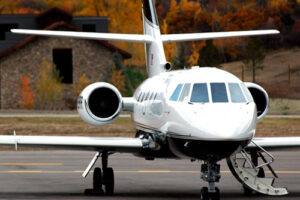 White Plane on Runway with Commercial Aviation Insurance