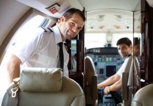 Pilot entering a Corporate Jet with Aircraft Liability Insurance